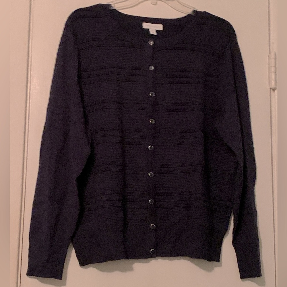 Women’s sweater size XL in navy blue.